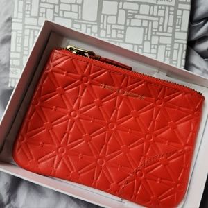 Comme des Garcons orange purse